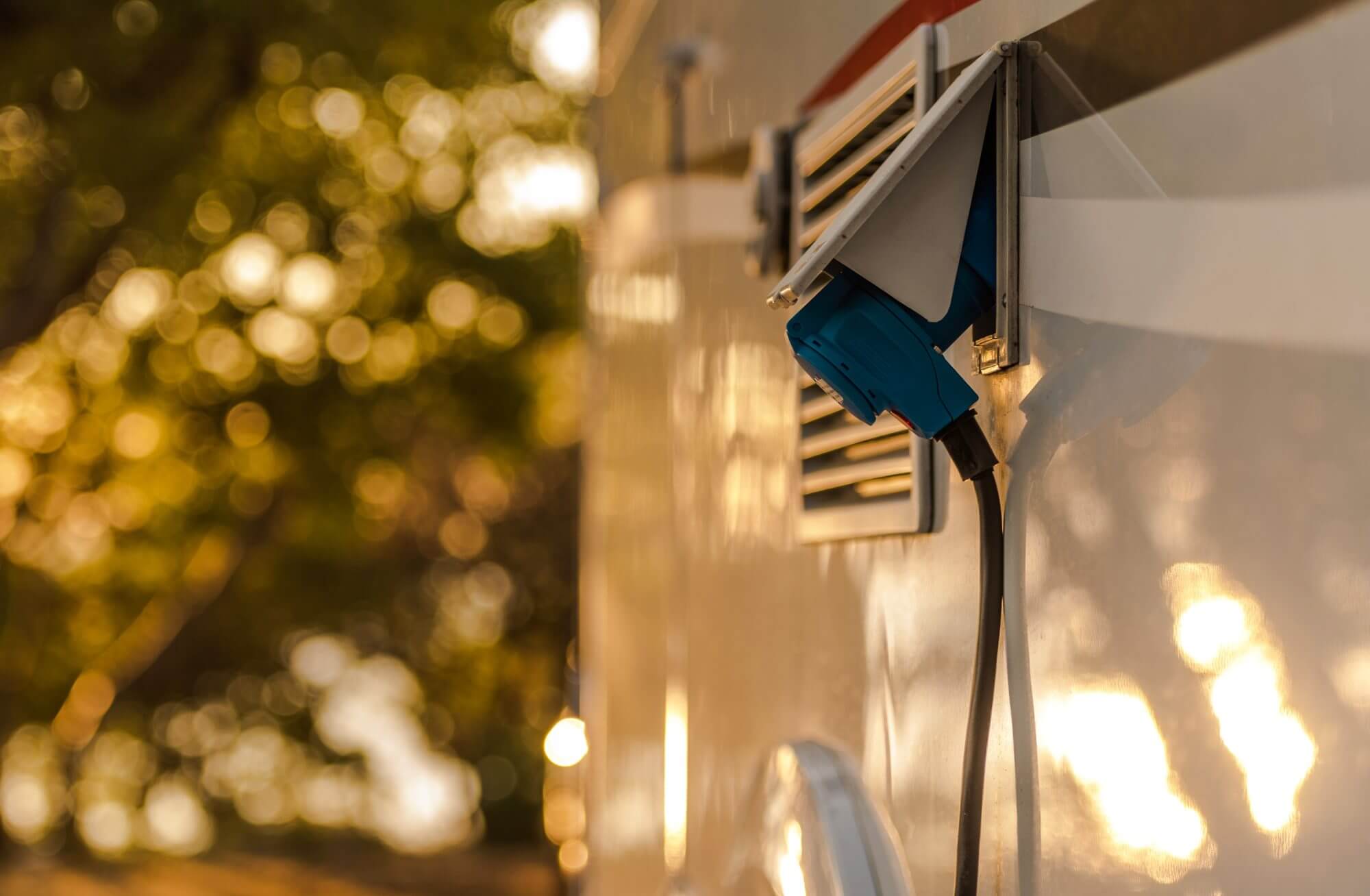 RV Motorhome Electric Hookup Closeup. Camping Feature.