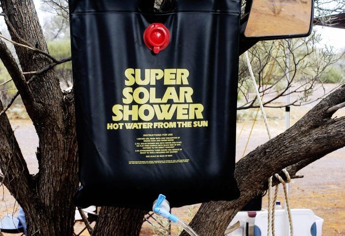 Western Australia, Australia - may 13, 2007: Small shower installed in the Australian outback sun to heat water to shower with water at the right temperature