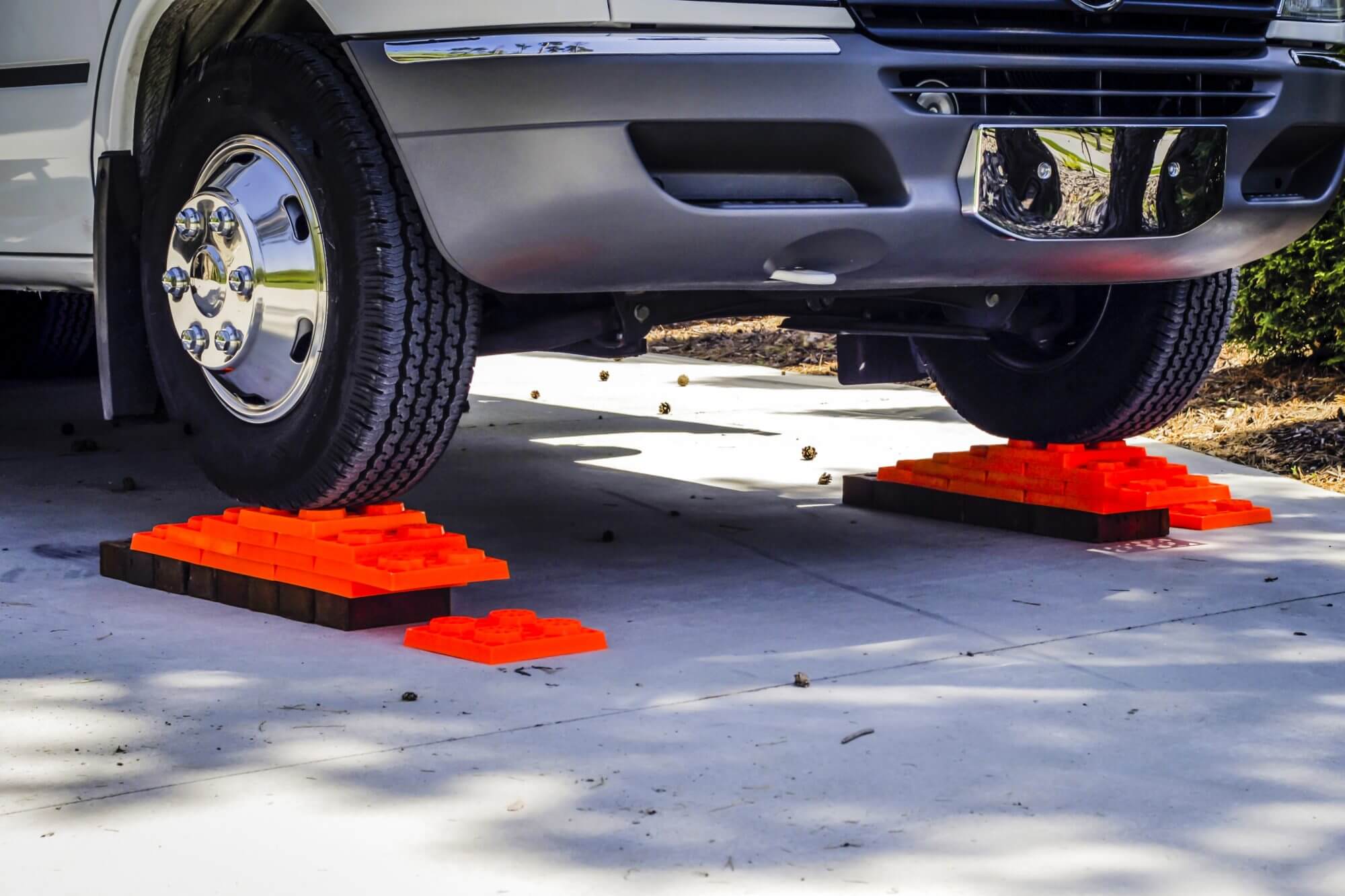 C-Class Motorhome on levelling blocks used to level the vehicle on uneven ground