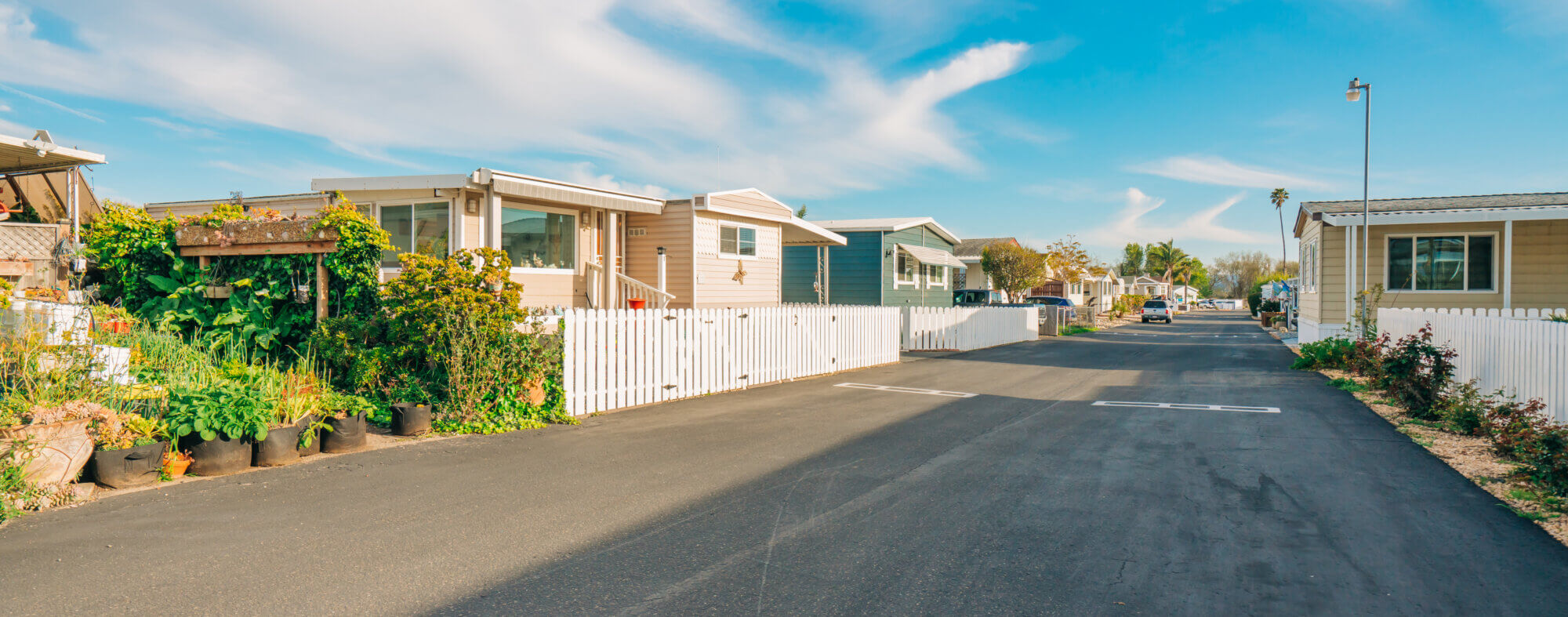 Mobile home park, age-restricted (55+) community in small beach town in California. Architecture, street view