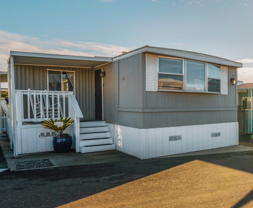 Mobile home park. A row of residential mobile park homes in a small town somewhere in California. Lifestyle, architecture, street view