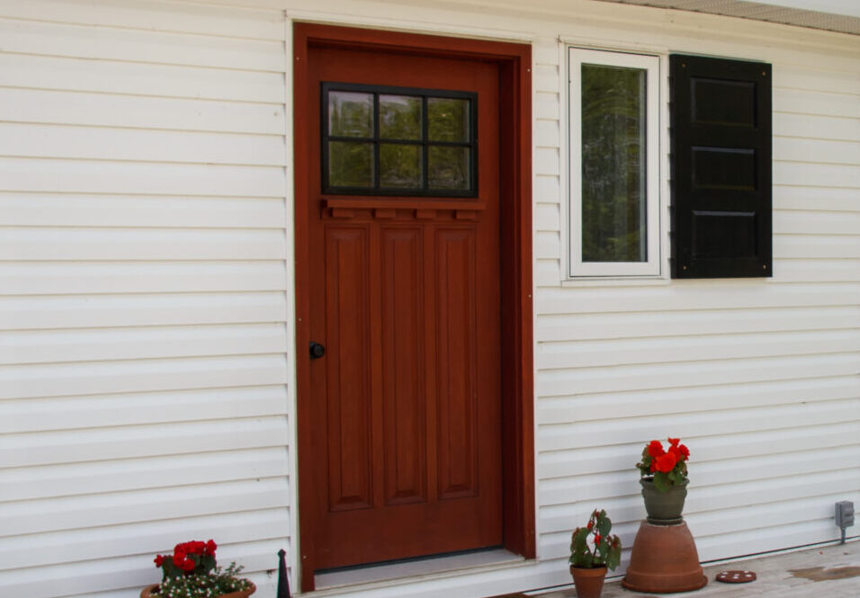 Exterior front porch with trees in the background